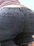 Vast ass Latina stretching jeans